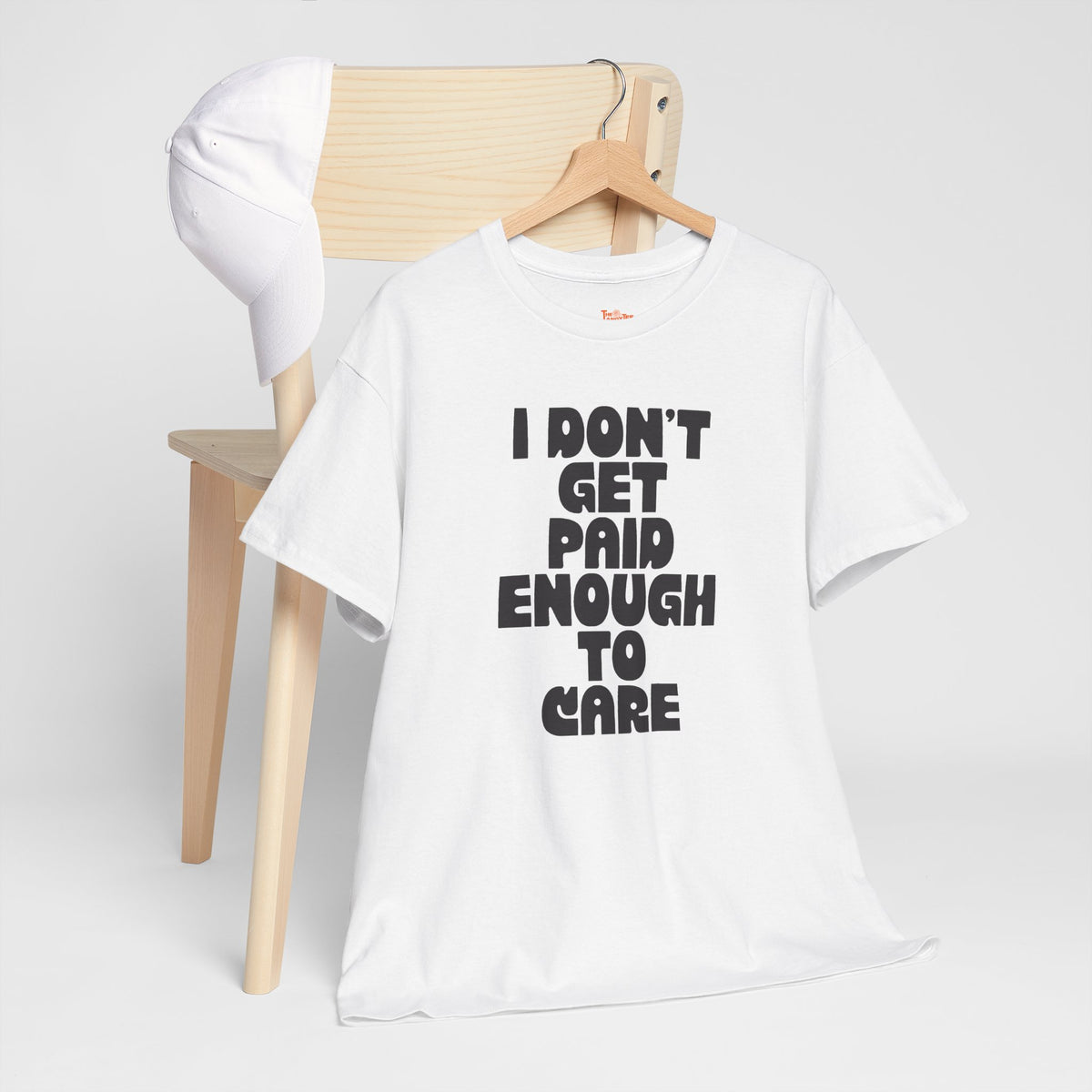 Graphic Tee — "I Don't Get Paid Enough to Care" Statement T-Shirt